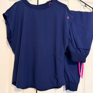 Med Couture Navy and Pink scrub set. Top and jogger bottom. Worn 1 time. Top is